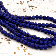 Load image into Gallery viewer, 4mm Melon Matte Indigo with Brown Wash Bead Strand
