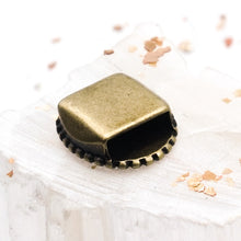 Load image into Gallery viewer, 10mm Antique Brass Flat Dotted Cabochon Slider for Flat Leather
