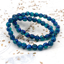Load image into Gallery viewer, 6mm Emerald with Metallic Blue Finish and Blue Wash Faceted Melon Bead Strand
