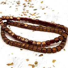 Load image into Gallery viewer, 4mm Ruby Red Cube Bead with a Gold Finish

