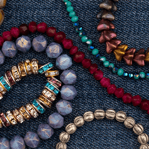 //candiecooper.com/cdn/shop/files/Circle_Web_Banners_Beads_300x300.png?v=1663124439