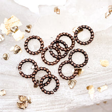 Load image into Gallery viewer, 5mm Antique Copper Twisted Jump Rings - 10pcs
