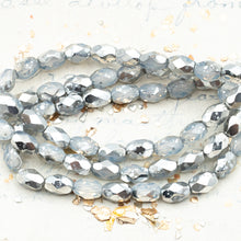 Load image into Gallery viewer, 7x5mm Faceted Oval Transparent Glass with a Silver Finish
