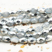 Load image into Gallery viewer, 7x5mm Faceted Oval Transparent Glass with a Silver Finish
